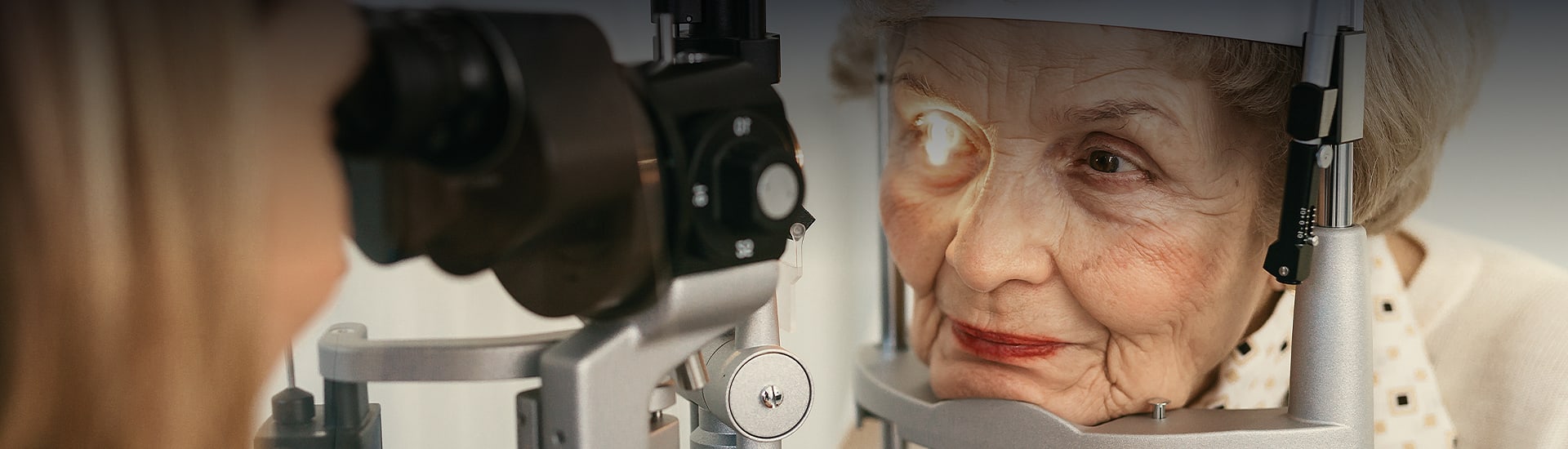 mature woman getting and eye exam