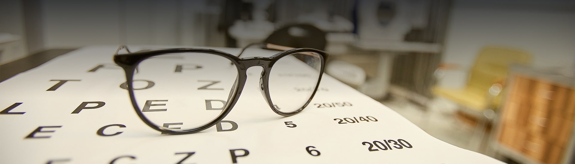 black glasses frames in an office