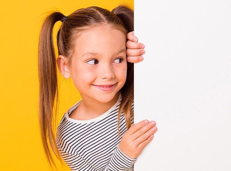 girl with pigtails and stiped shirt