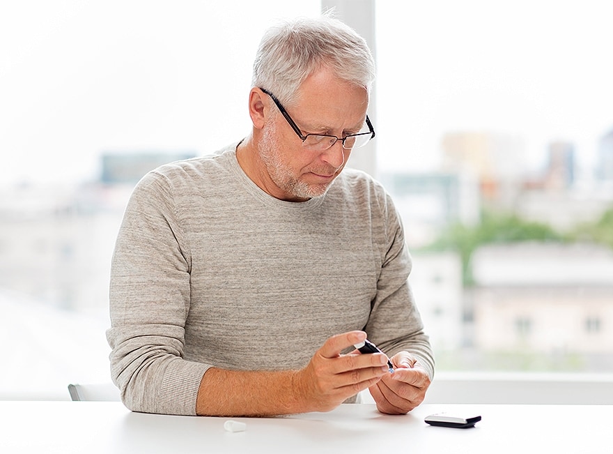 mature man wearing glasses