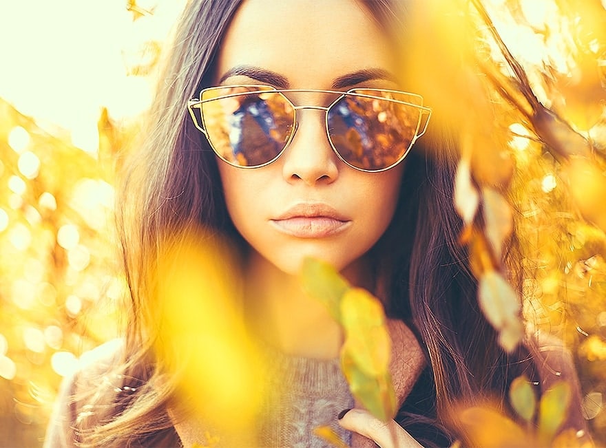 woman wearing sunglasses in fall